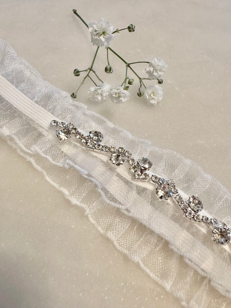 Strumpeband vitt med stenar strass