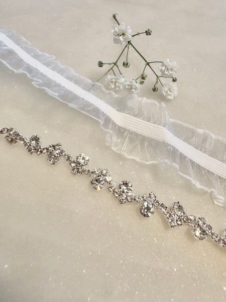 Strumpeband vitt med stenar strass