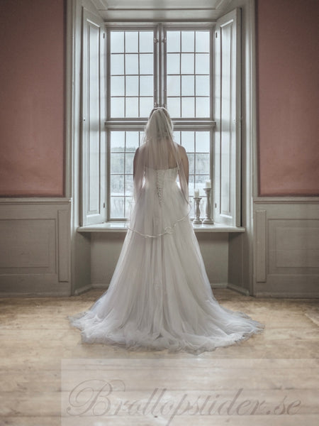 Brudslöja 100 cm i tyll med satinkant, ivory/creme