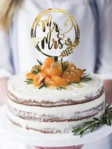 Cake topper/tårtdekoration Mr & Mrs guld till bröllopstårta